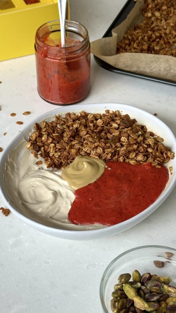 Festive Protein Yoghurt Bowl with Pistachio Granola and Strawberry Jam